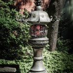 vintage carved and decorative cast iron lamppost on street of Salem, Mass, USA